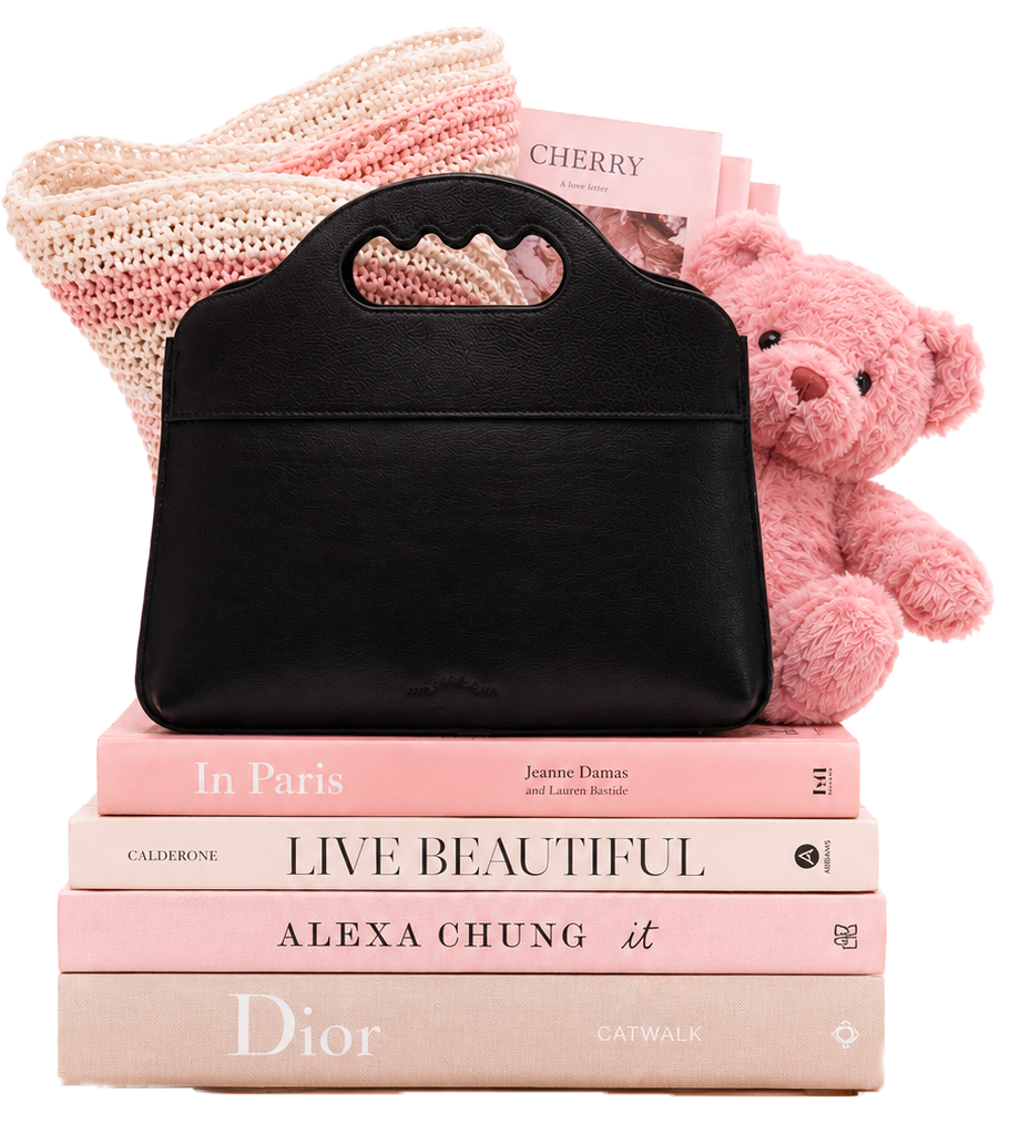 Tas de livres roses avce le sac dessus